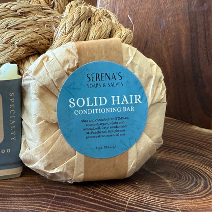 Two products from Serena's Soaps & Salves on a wooden surface